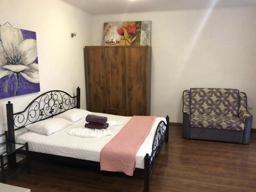 Кровать или кровати в номере Doba In Ua Centre Apartments