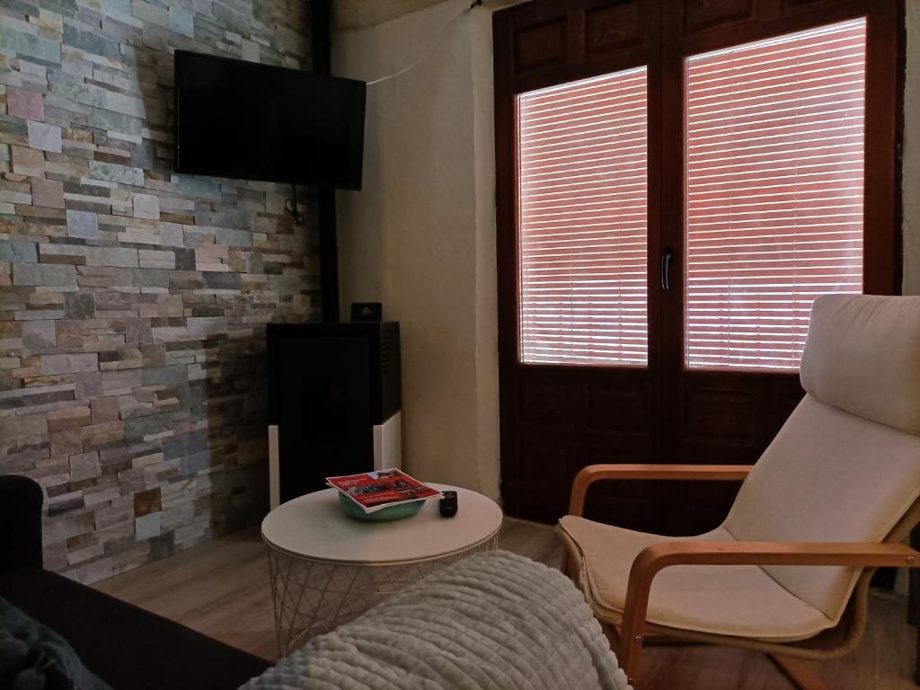 TV a/nebo společenská místnost v ubytování COMO EN CASA