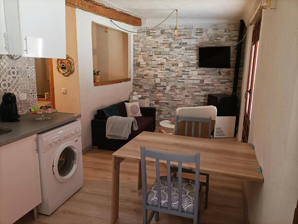 Kuchyň nebo kuchyňský kout v ubytování COMO EN CASA