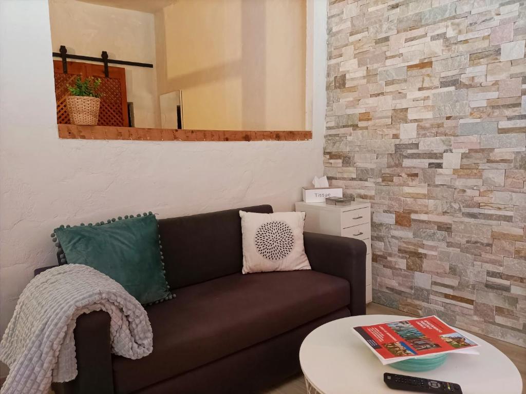 Posezení v ubytování COMO EN CASA