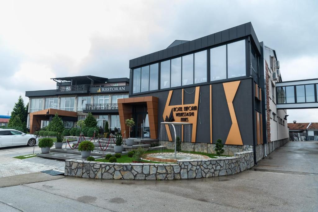 a large black building with a lot of windows at Hotel Euforia Lounge in Šabac