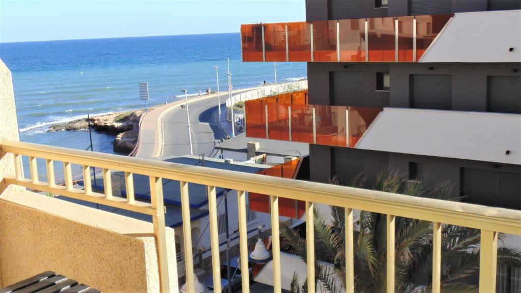 a view of the ocean from the balcony of a building at PALANGRE CON VISTAS AL MAR in Torrevieja