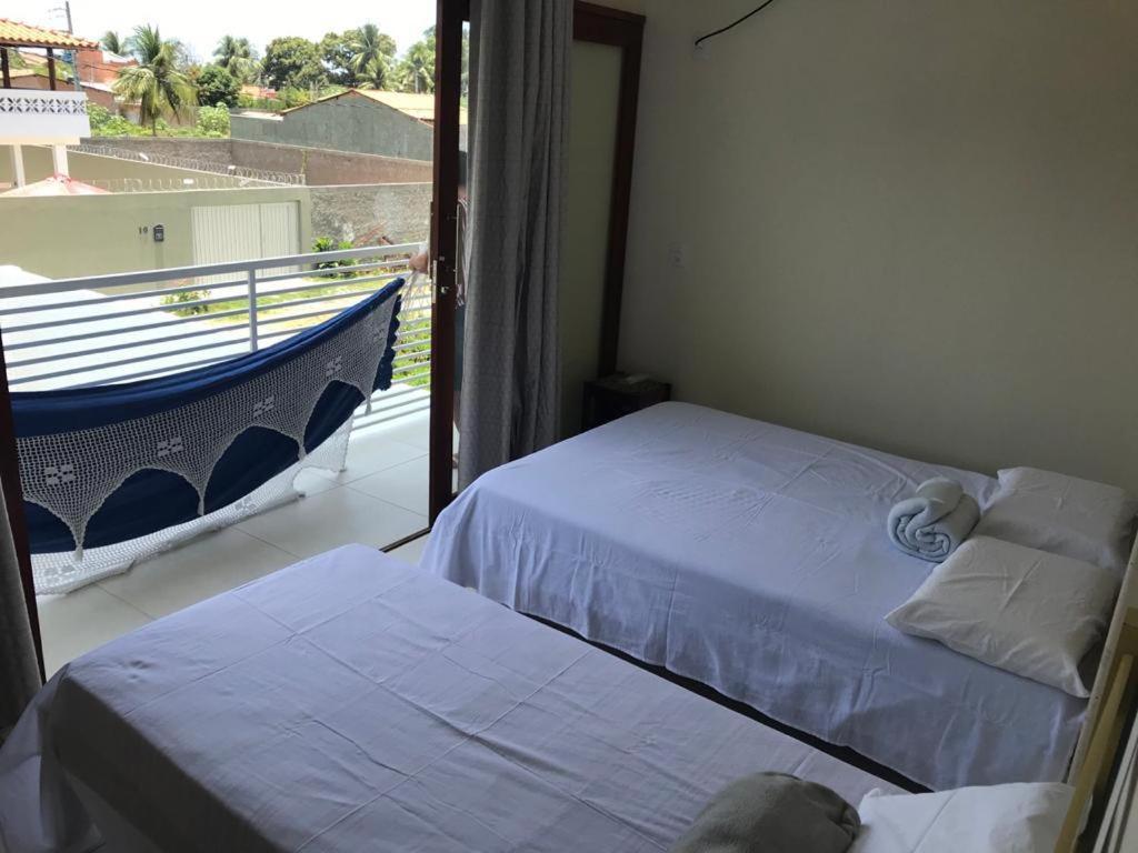 Postel nebo postele na pokoji v ubytování Casa de praia completa em Milagres