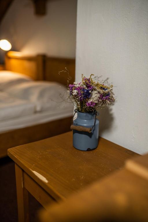 Postel nebo postele na pokoji v ubytování Penzion Panský dům
