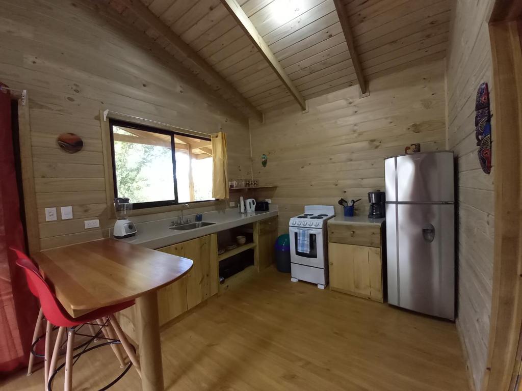 Kuchyň nebo kuchyňský kout v ubytování Cabinas Costa Tropicana