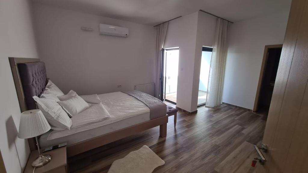 Posteľ alebo postele v izbe v ubytovaní KASNAR ROOMS
