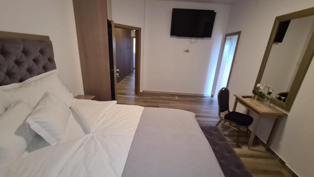 Posteľ alebo postele v izbe v ubytovaní KASNAR ROOMS