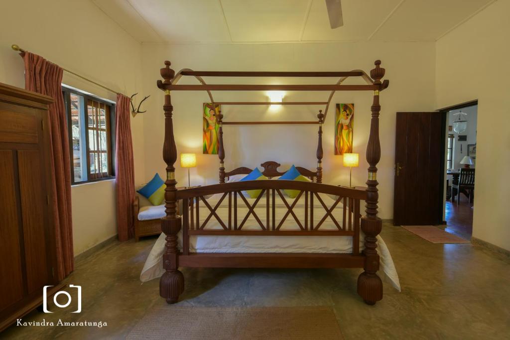 Postel nebo postele na pokoji v ubytování Captain's Bungalow, Kandy