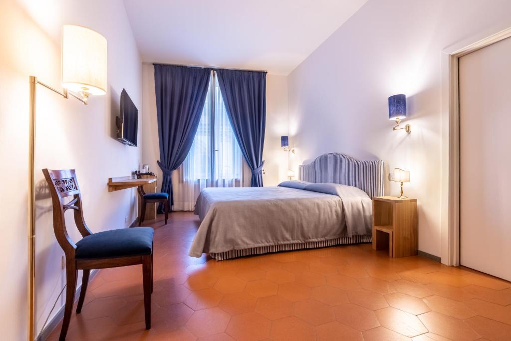 Posteľ alebo postele v izbe v ubytovaní La Casa del Ghiberti B&B
