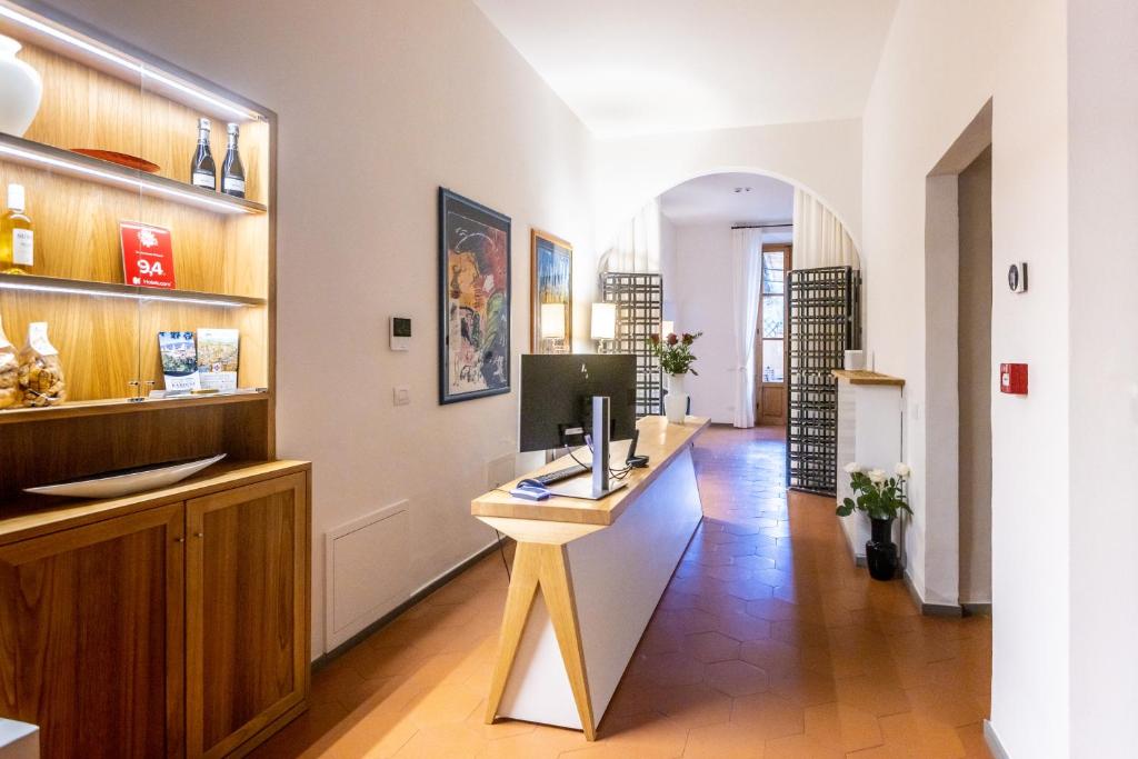Televízia a/alebo spoločenská miestnosť v ubytovaní La Casa del Ghiberti B&B