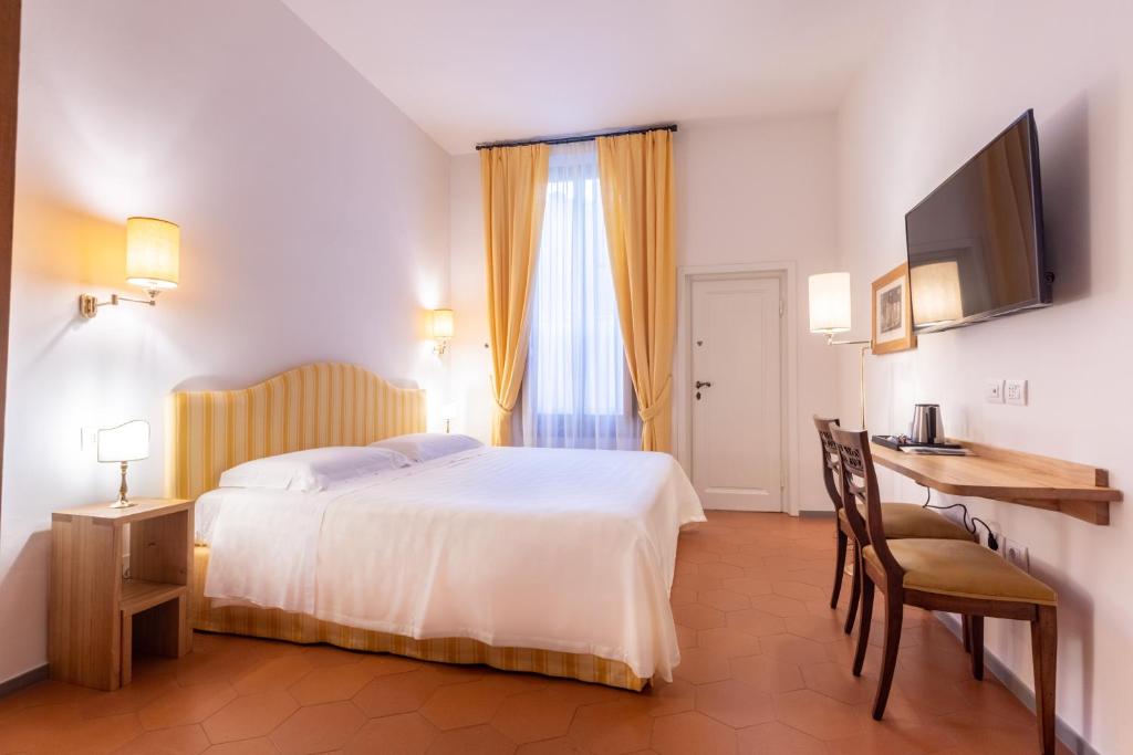 Posteľ alebo postele v izbe v ubytovaní La Casa del Ghiberti B&B