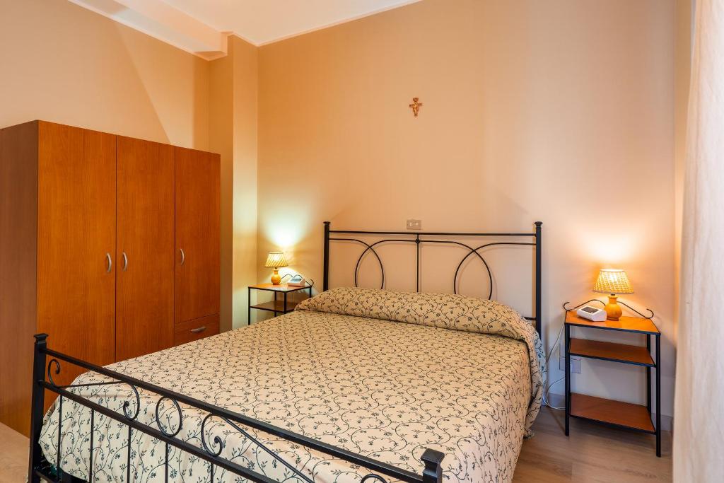 Posteľ alebo postele v izbe v ubytovaní Hotel Trasimeno