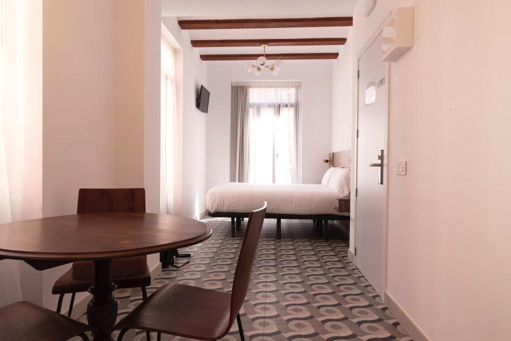 Postel nebo postele na pokoji v ubytování Hotel 19-30 Valencia