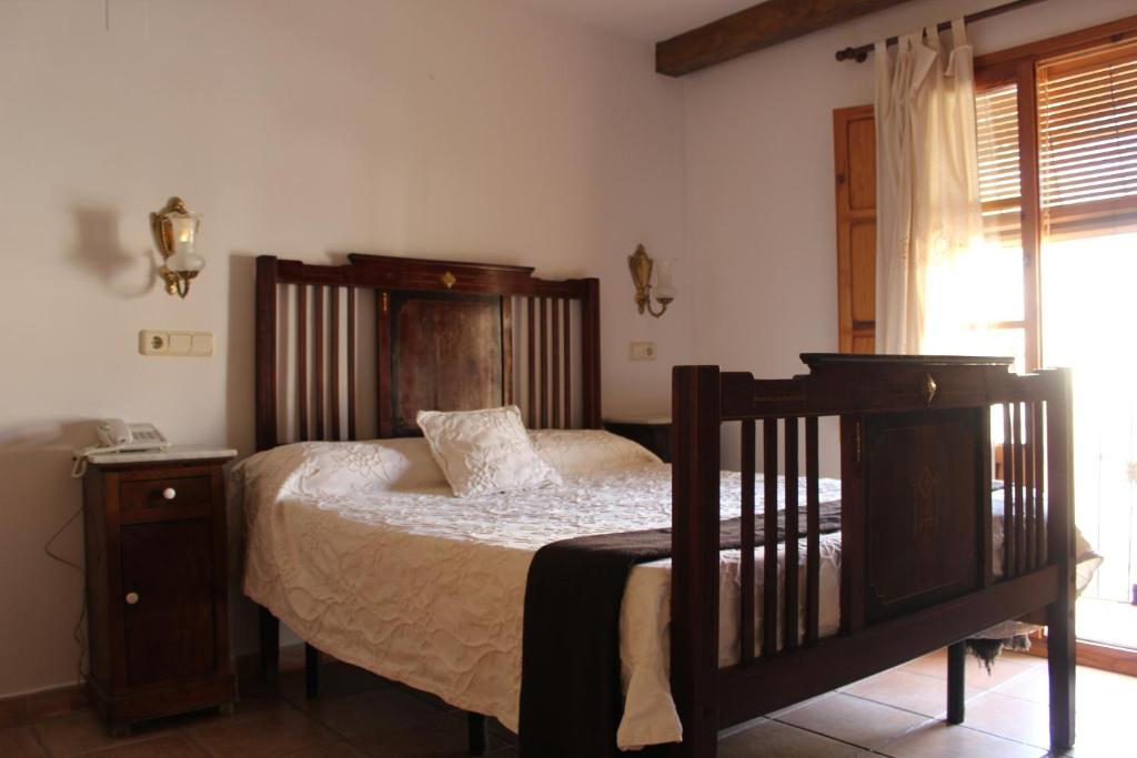 Posteľ alebo postele v izbe v ubytovaní Hotel La Villa
