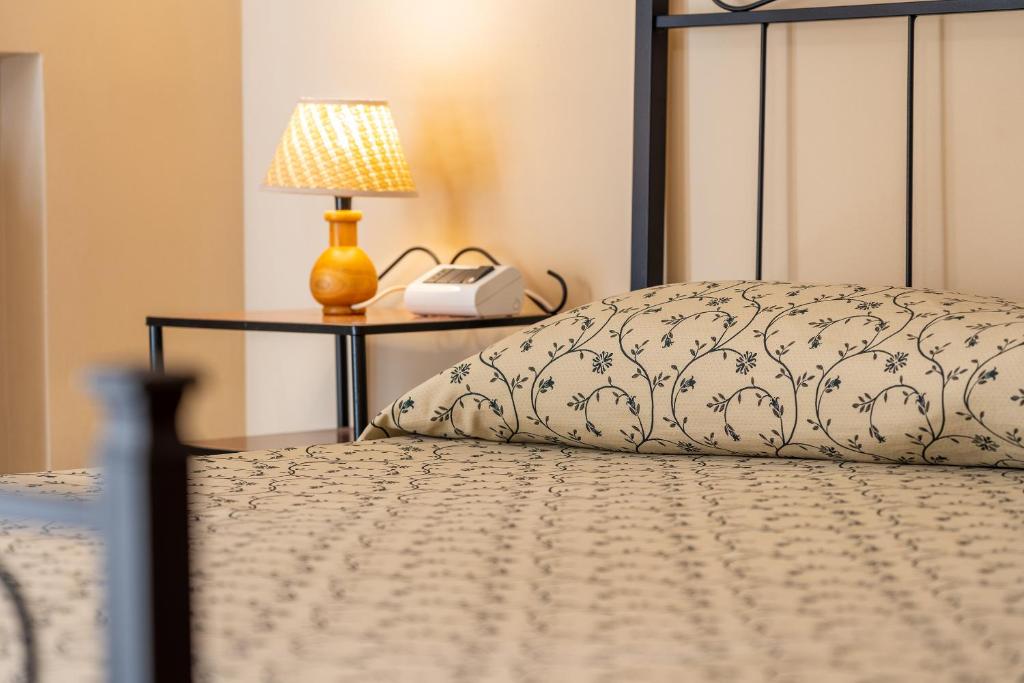 Posteľ alebo postele v izbe v ubytovaní Hotel Trasimeno