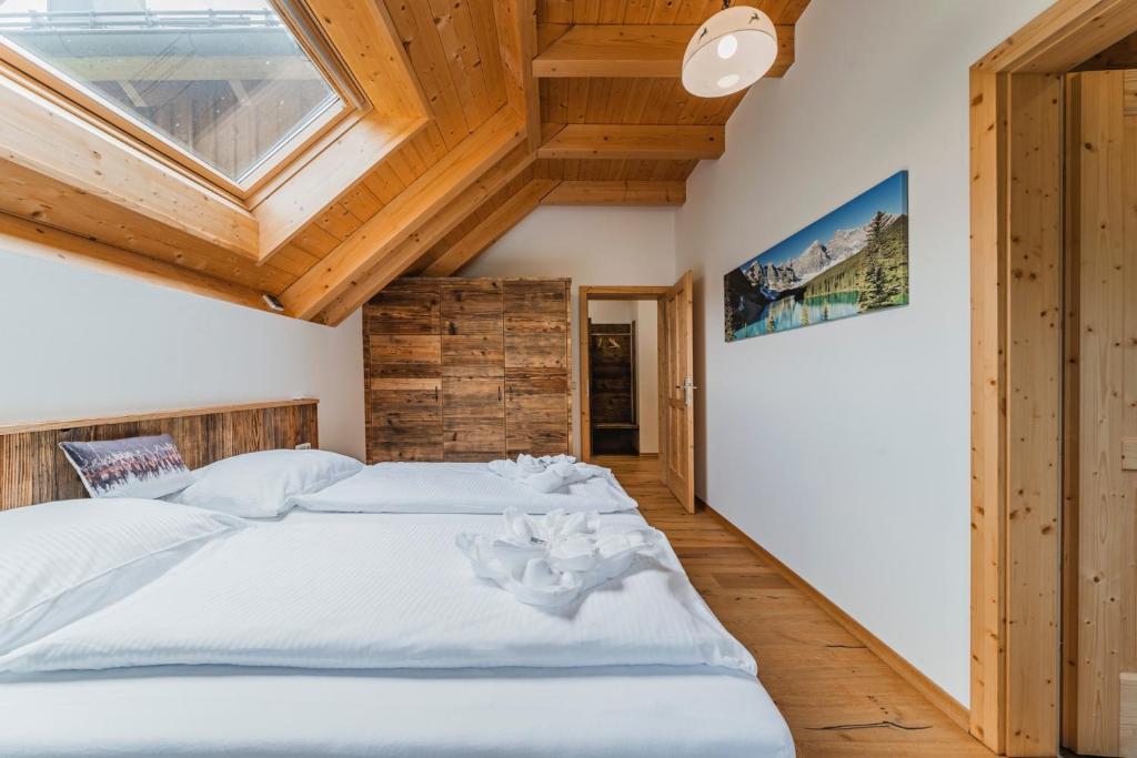 Postel nebo postele na pokoji v ubytování Penthouse Weiglhof