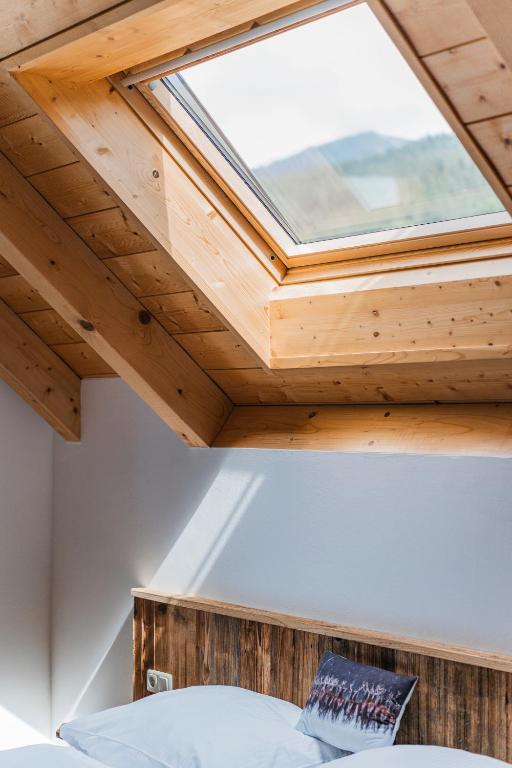 Postel nebo postele na pokoji v ubytování Penthouse Weiglhof