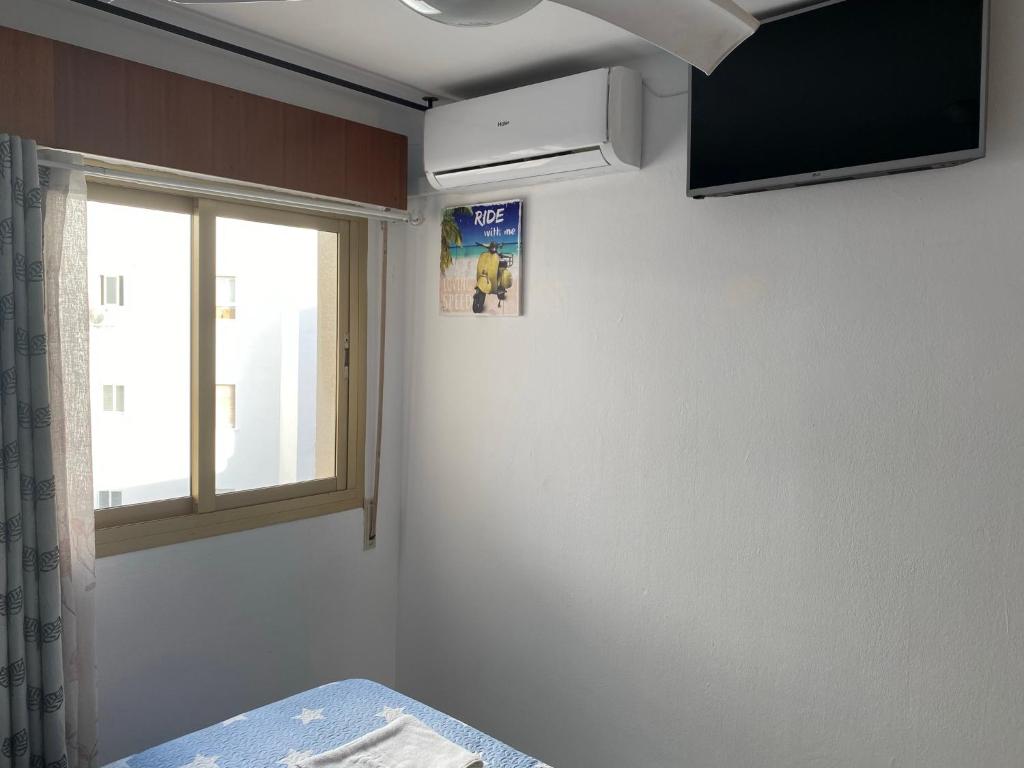 TV a/nebo společenská místnost v ubytování Málaga Centro habitaciones privada en apartamento compartidos