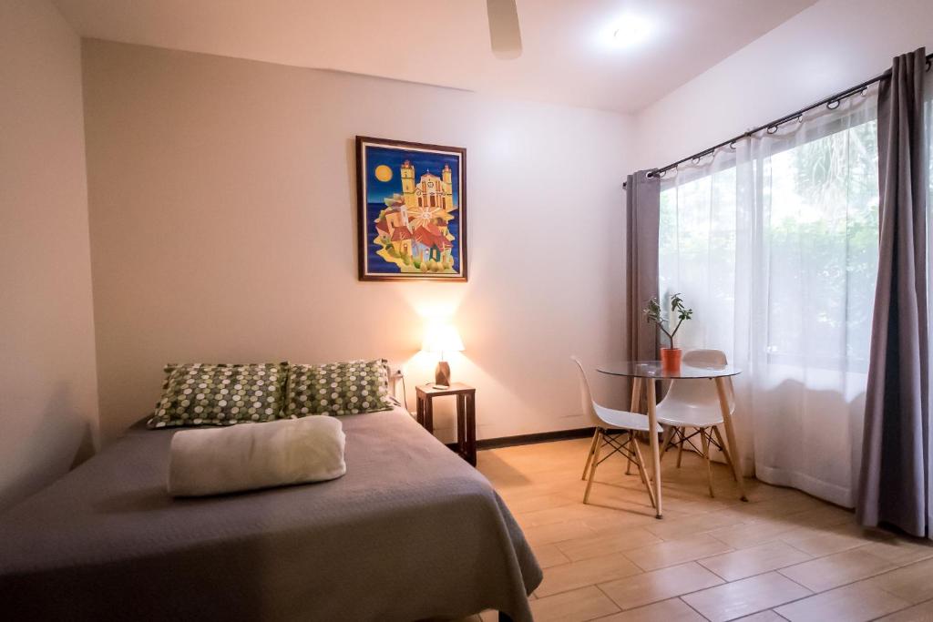 Postel nebo postele na pokoji v ubytování Terida Airport B&B