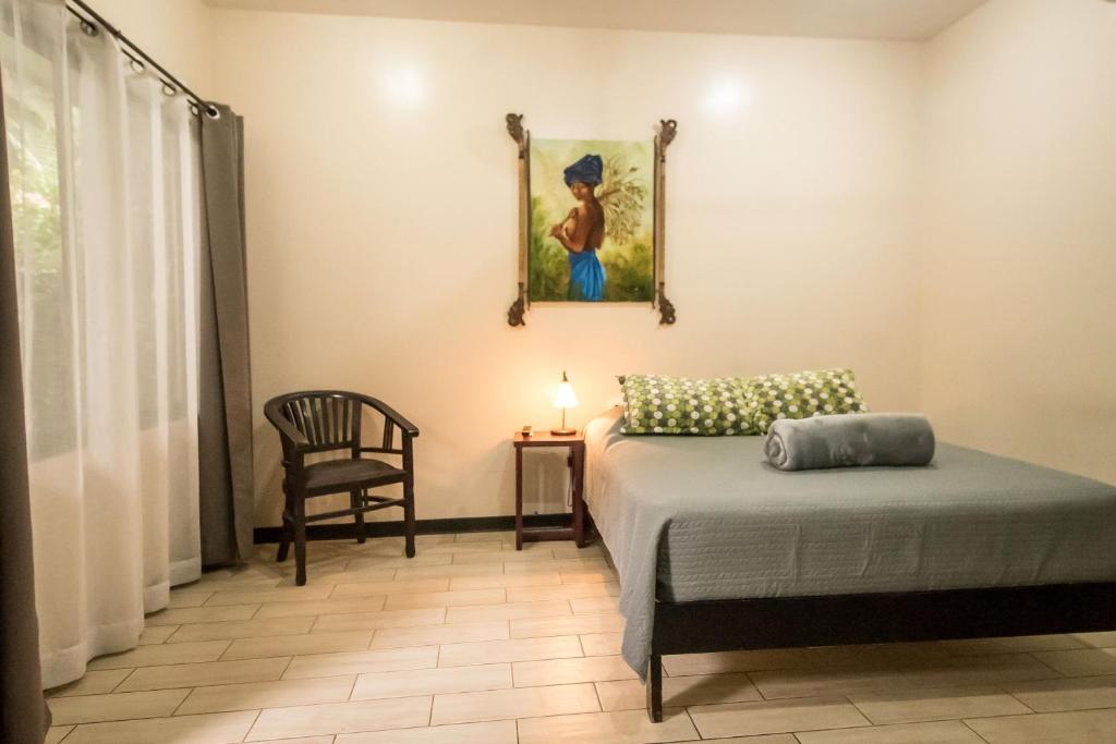Postel nebo postele na pokoji v ubytování Terida Airport B&B