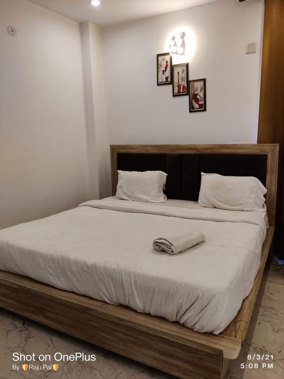 Postel nebo postele na pokoji v ubytování Hotel Rivasa Regency