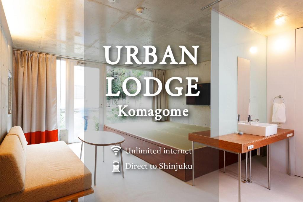 a bathroom with a sign that reads urban lodge komento at URBAN LODGE Komagome in Tokyo