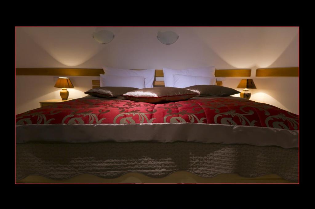 Postel nebo postele na pokoji v ubytování Hotel Berr