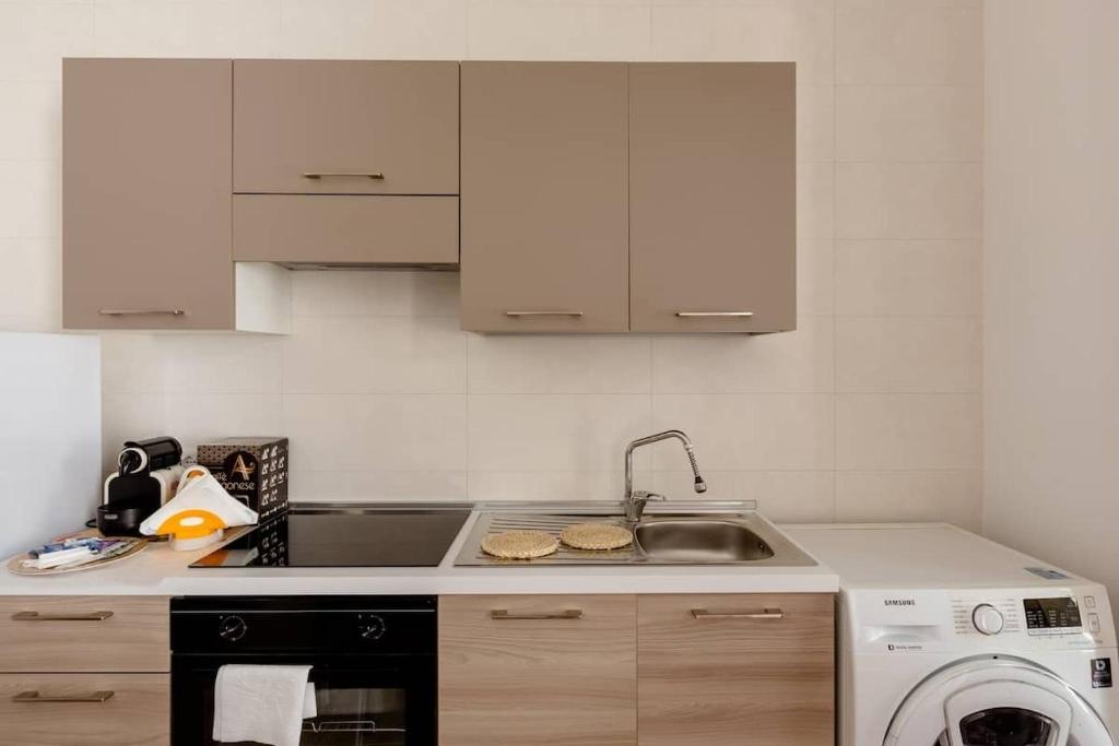 A kitchen or kitchenette at Casa Vacanze La Primitiva