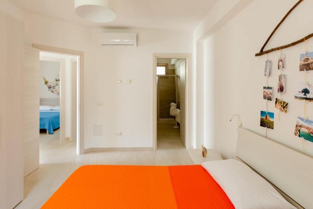 A bed or beds in a room at Casa Vacanze La Primitiva