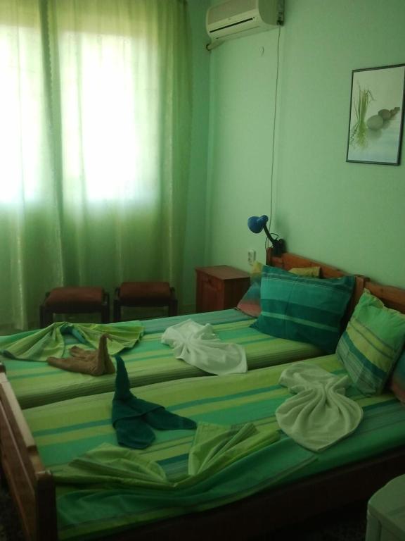 Postel nebo postele na pokoji v ubytování Hotel Strajica