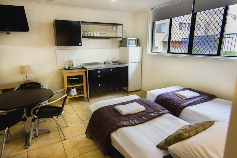 Postel nebo postele na pokoji v ubytování Horizons Motel