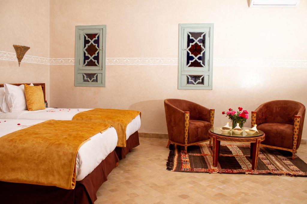 Uma cama ou camas num quarto em Borj Des Cascades & Spa