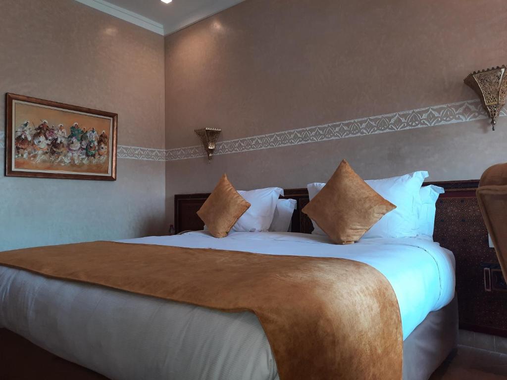 Uma cama ou camas num quarto em Borj Des Cascades & Spa