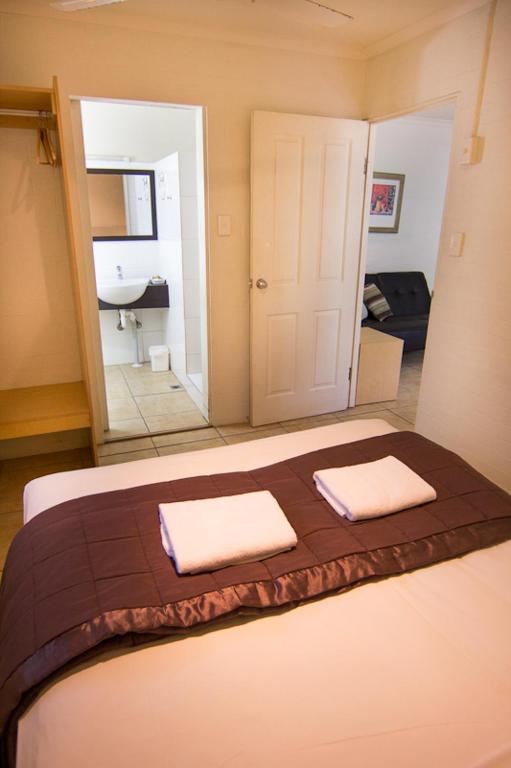 Postel nebo postele na pokoji v ubytování Horizons Motel