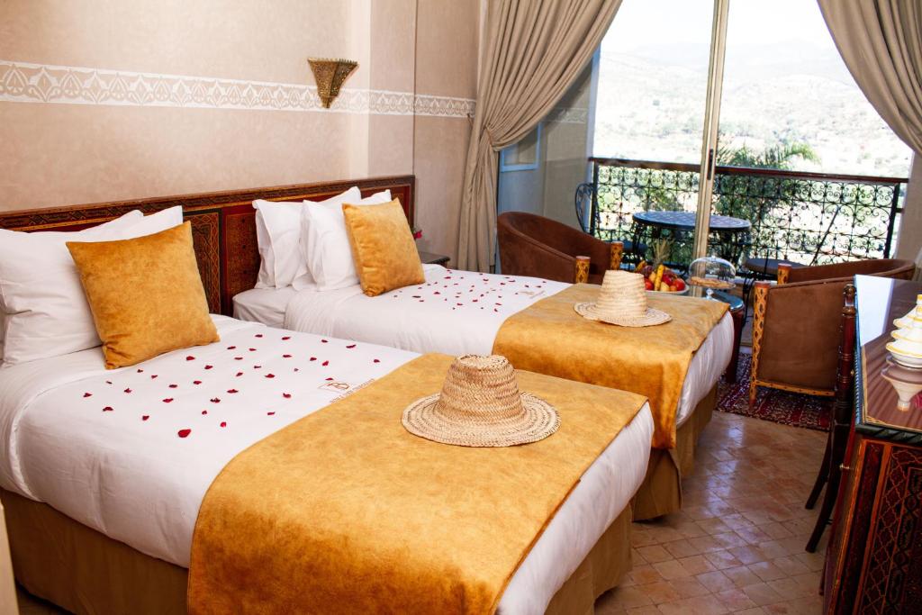 Uma cama ou camas num quarto em Borj Des Cascades & Spa