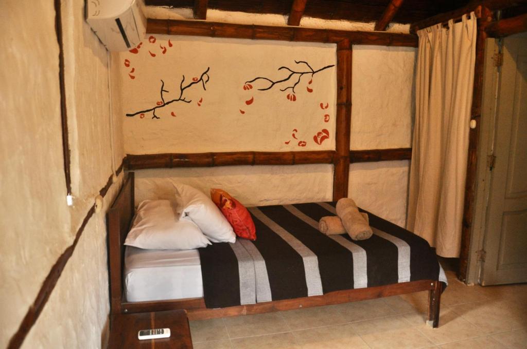 Postel nebo postele na pokoji v ubytování Viejamar B&B