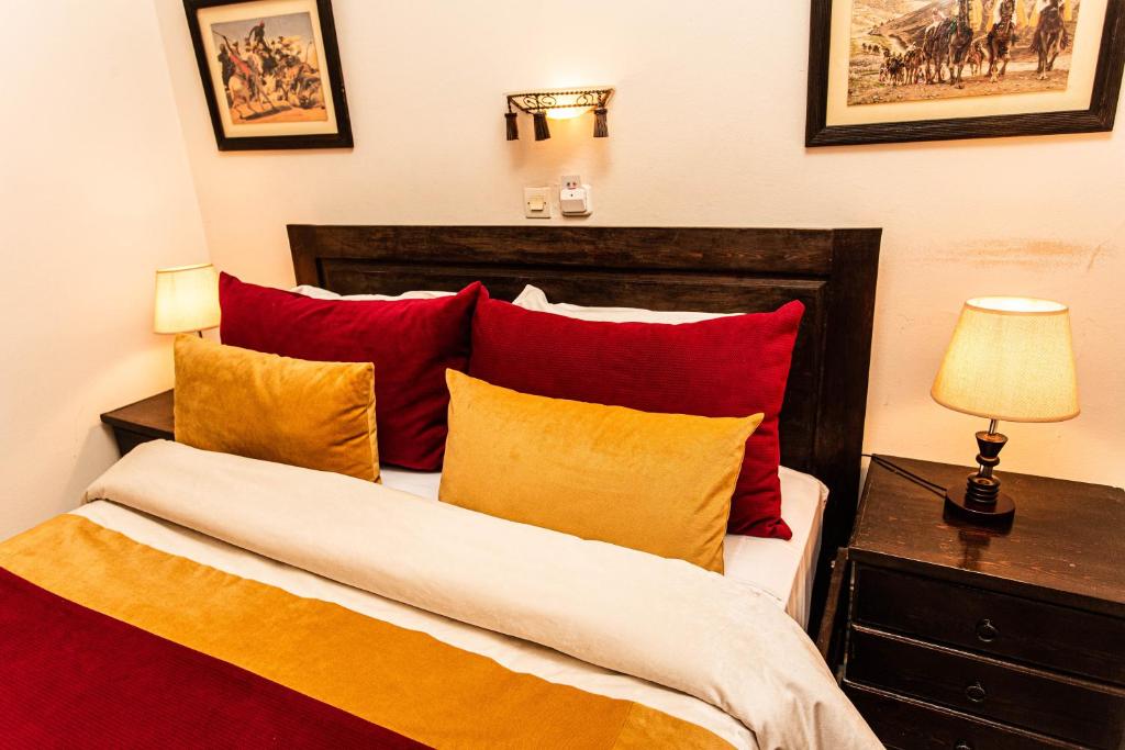 Una cama o camas en una habitación de Dar Salam Palm - 2024 Travellers' choice