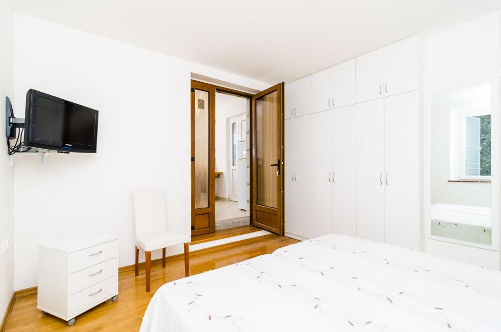 Posteľ alebo postele v izbe v ubytovaní A4-harmony Apartment Close To The Sunset Beach And Lapad Promenade