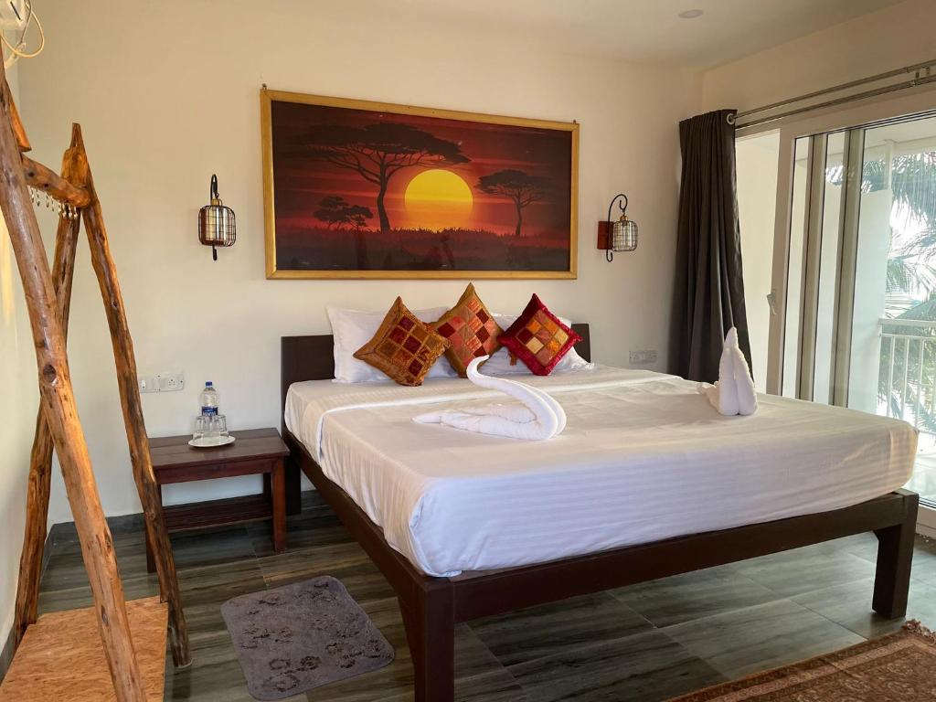 Postel nebo postele na pokoji v ubytování Chique Shanti Resort