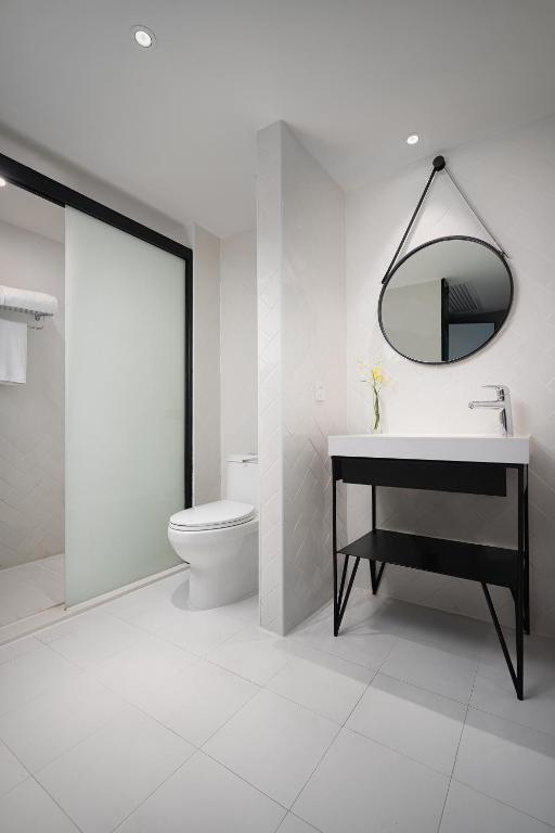 Koupelna v ubytování 有集城市客栈锦绣中华店Unijoy Cityinn Splendid China Shenzhen