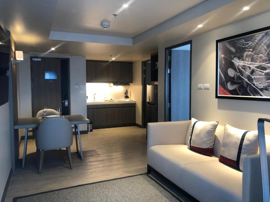 Uma cama ou camas num quarto em Seda Residences Makati