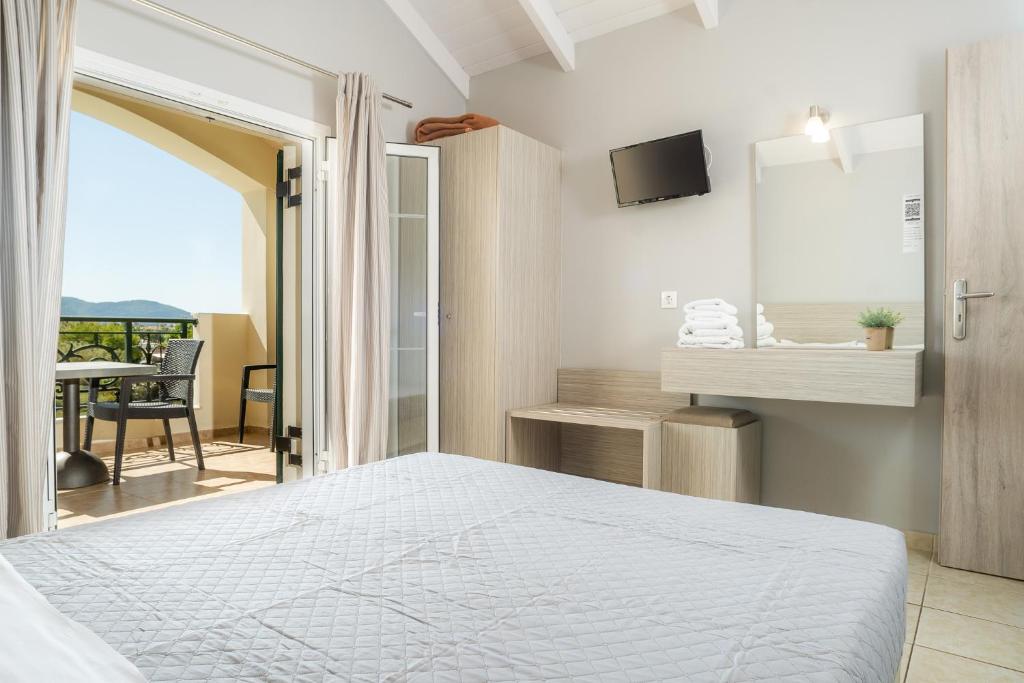 Posteľ alebo postele v izbe v ubytovaní Zante Atlantis Hotel
