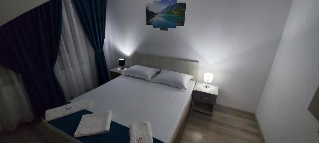 Postel nebo postele na pokoji v ubytování Cabana Mea STRAJA