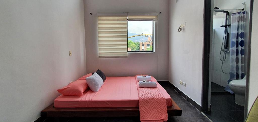 Postel nebo postele na pokoji v ubytování Hostel Metro Floresta Alojamiento