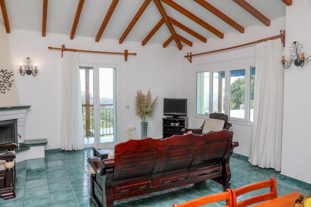 Coin salon dans l'établissement VILLA MITZELOS