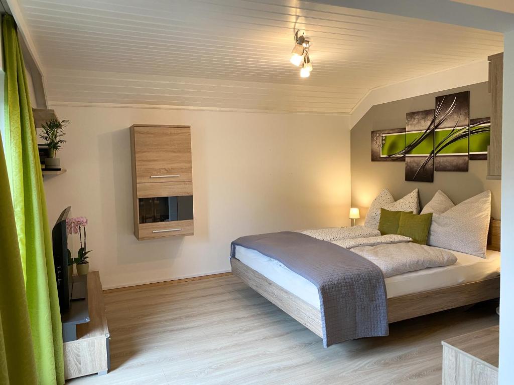 En eller flere senge i et værelse på Apartment Bergfeeling