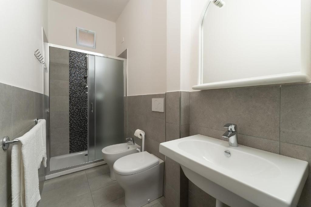 Koupelna v ubytování Hotel Delfino