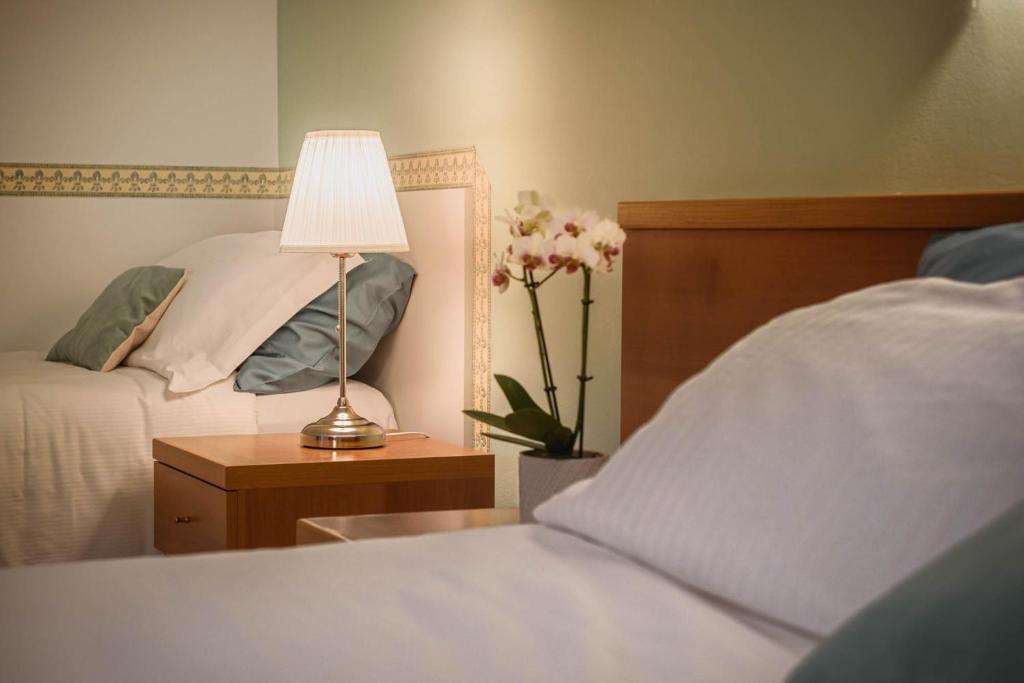 Hotel Roma - Komfort-Dreibettzimmer