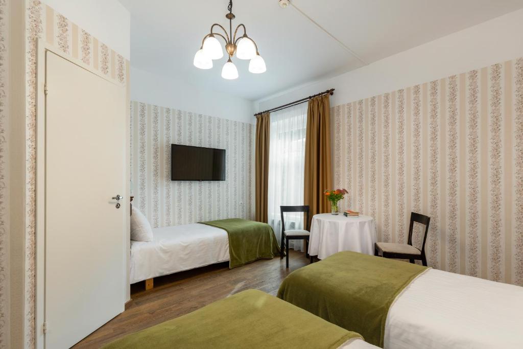 Postel nebo postele na pokoji v ubytování Verevi Motel