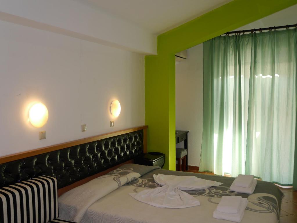 Posteľ alebo postele v izbe v ubytovaní Blue Sky Villas